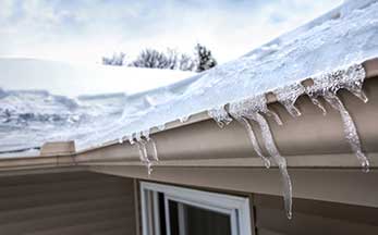 Roof Shoveling & Raking: What You Need To Know About Roof Snow & Ice Dams